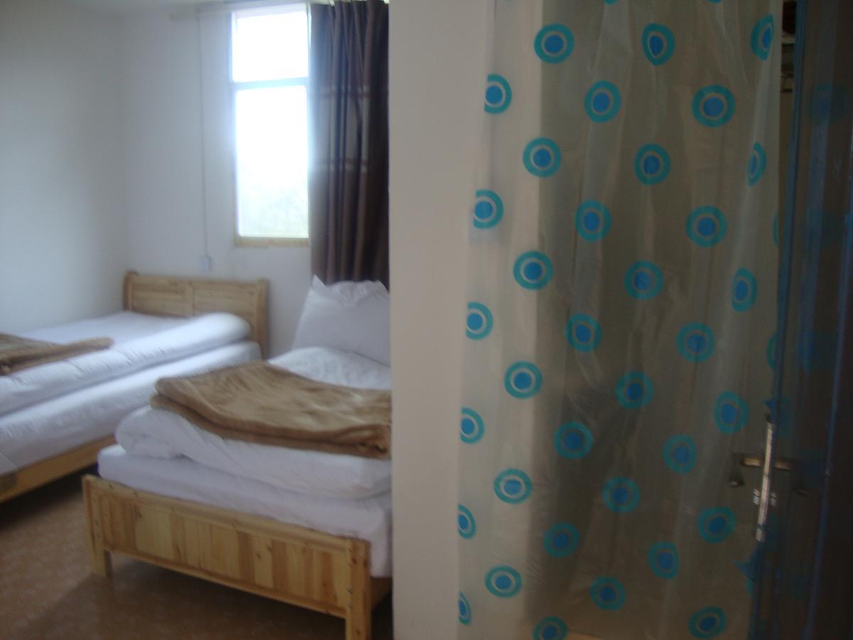 Belinda Backpackers Guesthouse Yuanyang  Quarto foto